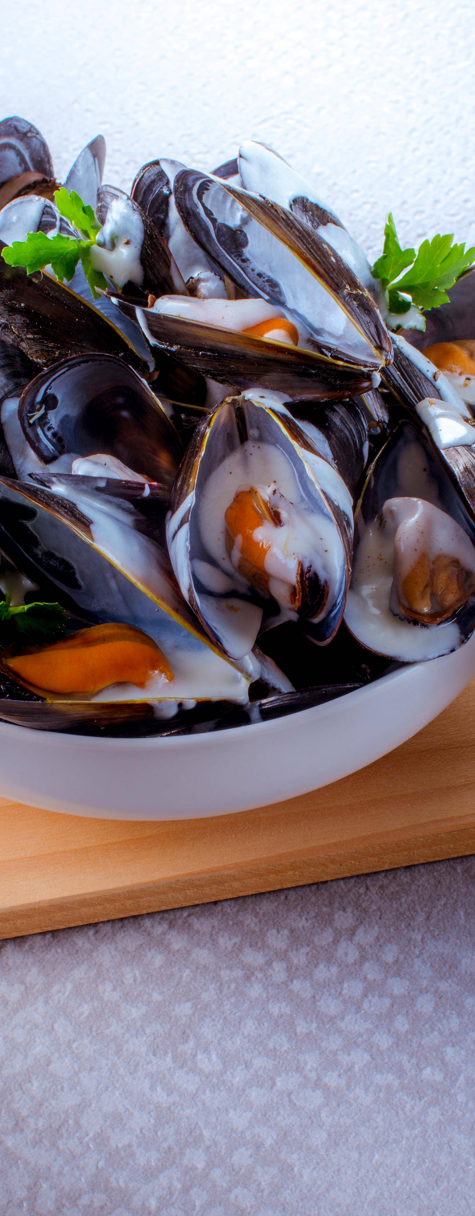 Almejas y mejillones en salsa de vino y tomate - Receta Click&Cook | Moulinex